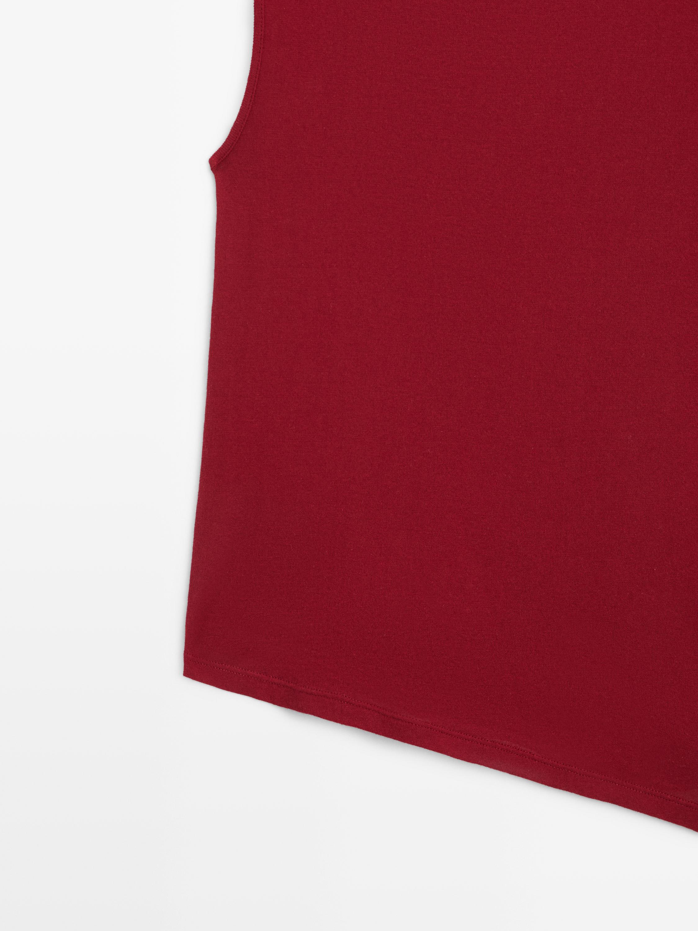 100% cotton top with asymmetric detail